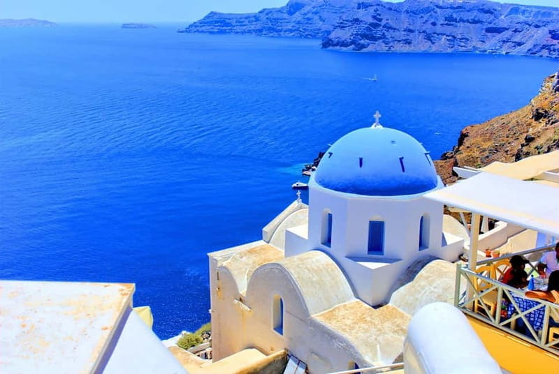 Crete: Santorini Day Trip with Fast Ferry Cruise - What the guide and bus arrangement add