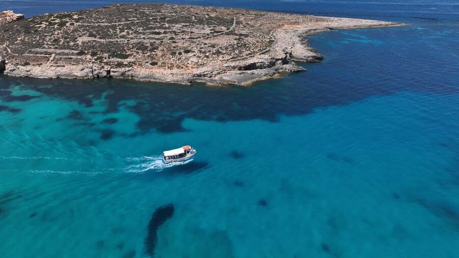 Ferry service to Blue Lagoon (opt. stop in Gozo)& Caves trip - Seeing the Caves on the Way