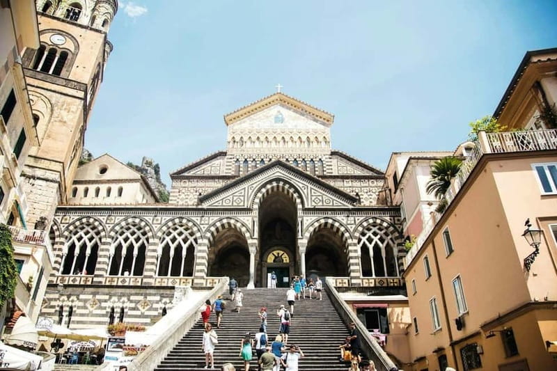 From Sorrento: Amalfi Coast Guided Bus Tour and Ferry Ride - Amalfi provides the day’s main town visit