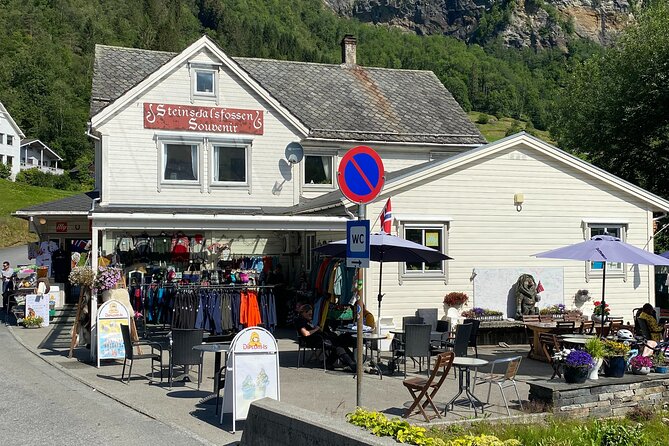 Guided tour to Hardanger Fjord, Waterfalls and Ferry Crossing - Utne offers an old wooden village setting