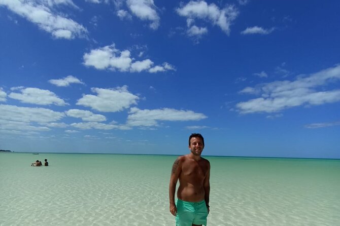 Holbox Island Tour Golf Cart Ferry with Lunch and Transportation - Cancellation, Weather, and Booking Timing