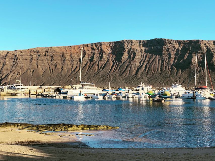 Lanzarote: Return Ferry to La Graciosa with Bus Pickup - Beaches, Walking, and Lunch