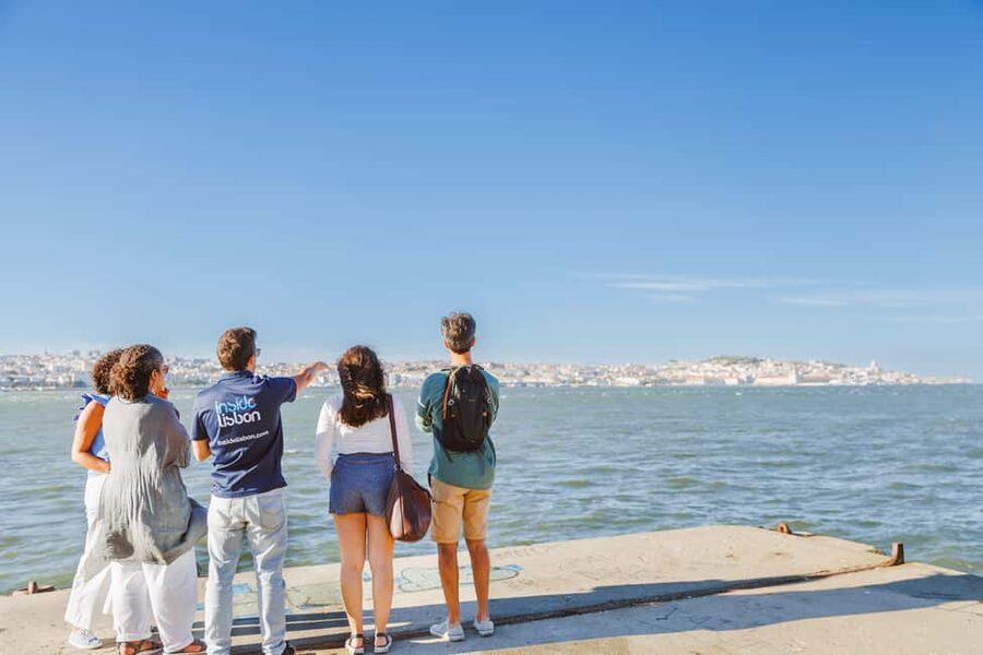 Lisbon Hidden Gems Walk: Traditions, Lunch & Ferry Ride - Starting at Martim Moniz and entering Mouraria