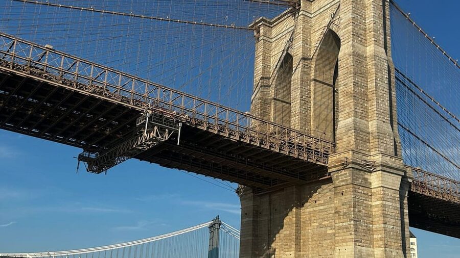 NYC: Brooklyn Bridge and DUMBO Tour with East River Ferry - Crossing the Brooklyn Bridge, one photo stop at a time