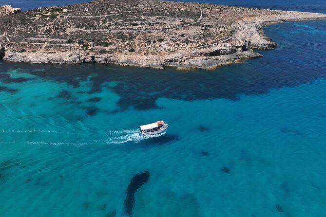 Roundtrip Ferry to Comino Blue Lagoon with Gozo Option - Arriving at the Blue Lagoon