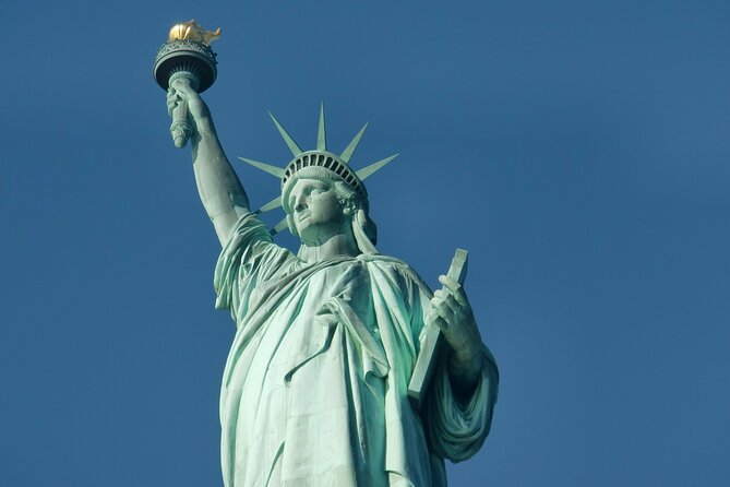 Statue of Liberty Express Roundtrip Ferry Ticket - Ellis Island adds a second, very different story