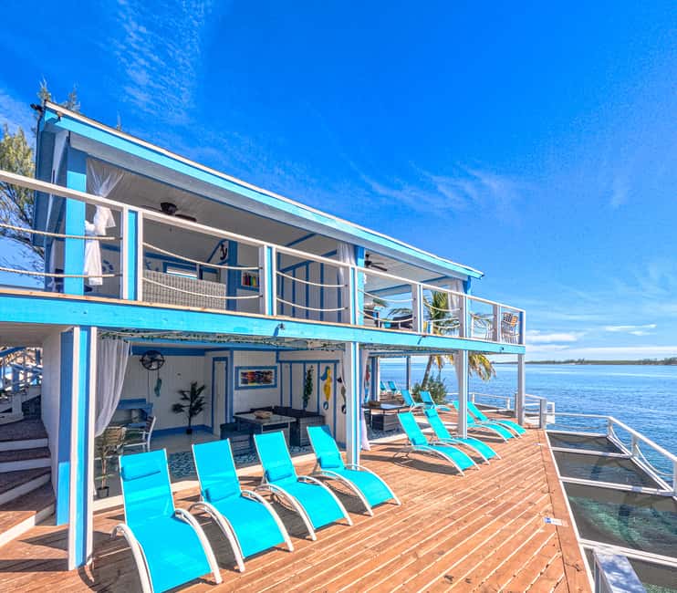 SunCay Private Oceanview Villa up to 6 with Lunch and Ferry - Snorkeling among statues, reef, and a shipwreck