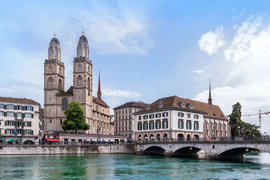 Zurich: City Highlights Tour by Bus, Cable Car, and Ferry - Crossing Lake Zurich by ferry with the bus